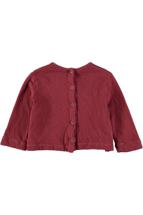 t shirt bébé rouge avec une broderie sapin