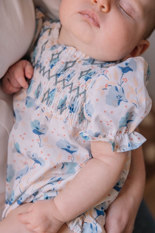 Floral baby romper with smocks
